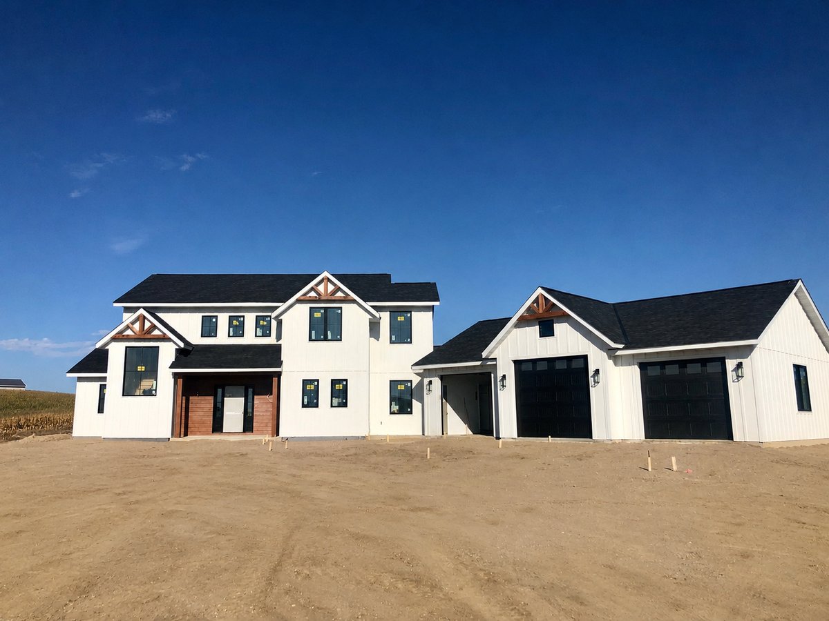 White two-story custom home