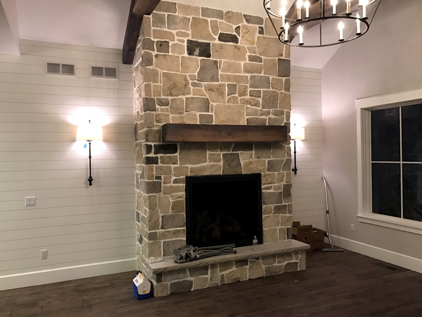 Interior of a Bludorn-built custom home with a stone fireplace